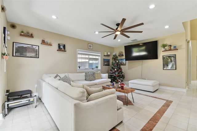 tiled living room featuring ceiling fan