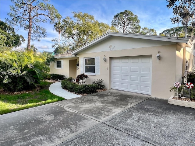 single story home with a garage