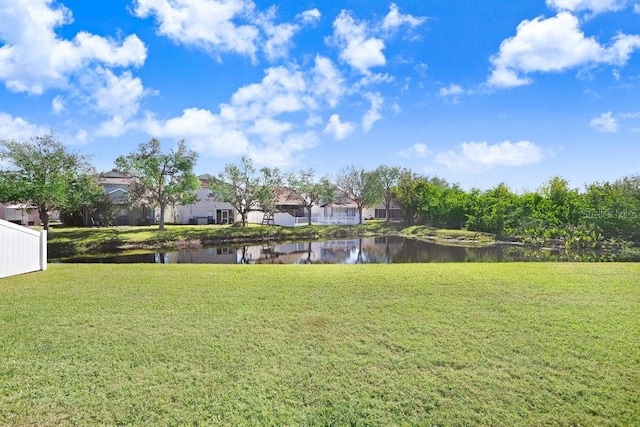 view of yard with a water view