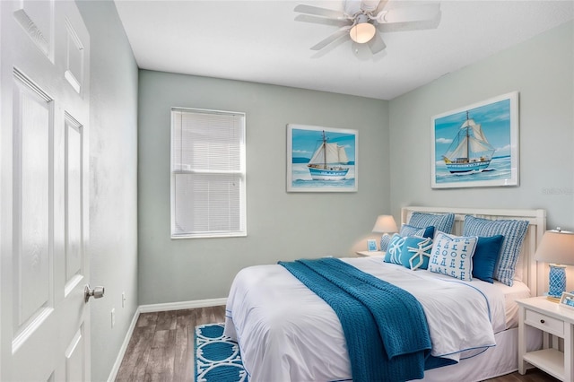 bedroom with hardwood / wood-style floors and ceiling fan