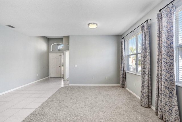 view of tiled spare room