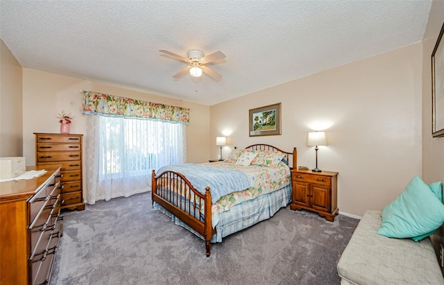 bedroom with carpet flooring, ceiling fan, a textured ceiling, and baseboards