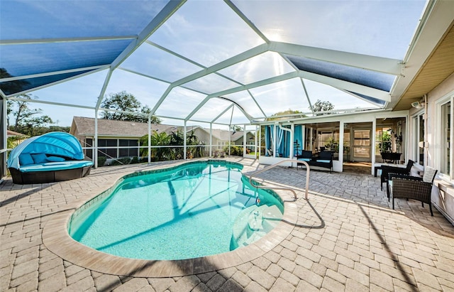 pool featuring a patio and a lanai