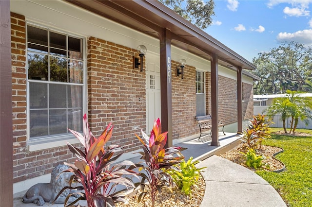 property entrance featuring covered porch