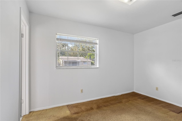 spare room with carpet flooring