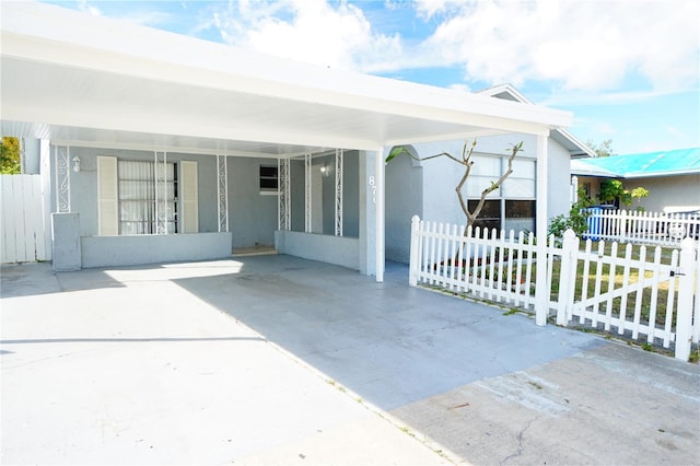 view of patio with a carport