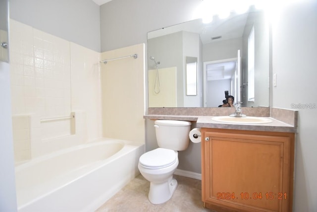 full bathroom featuring tile patterned floors, vanity, shower / bathtub combination, and toilet