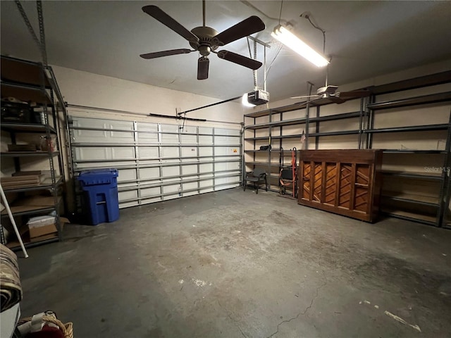 garage featuring a garage door opener and ceiling fan