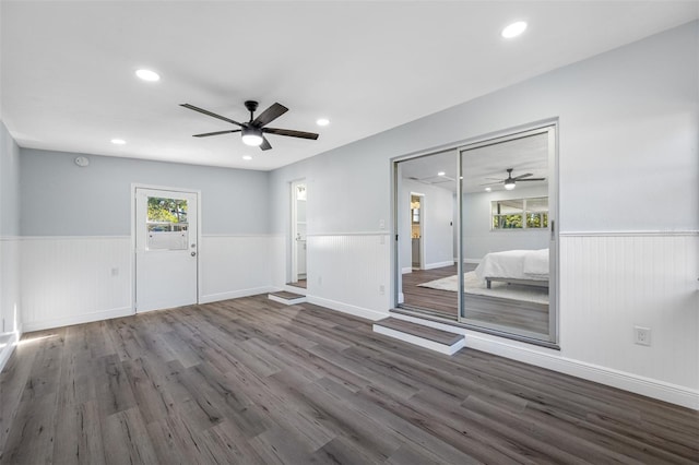 spare room featuring ceiling fan and wood-type flooring