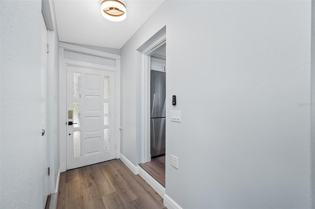 corridor featuring light wood-type flooring