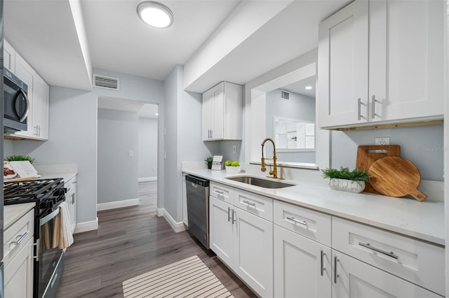 kitchen featuring white cabinets and stainless steel appliances