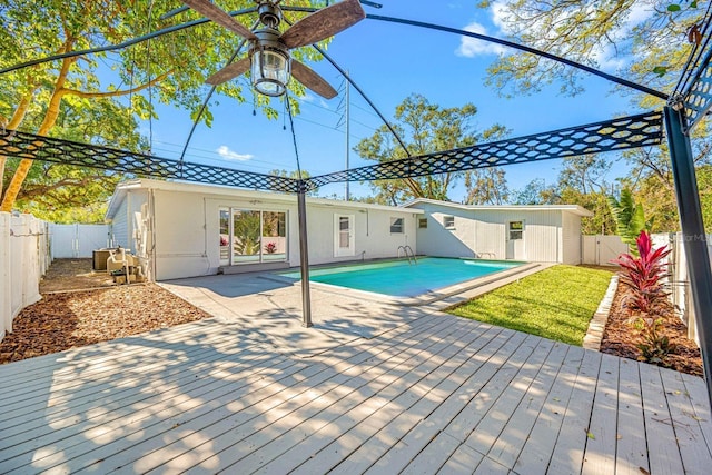 view of pool with a patio, ceiling fan, and central air condition unit