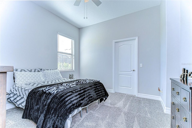 bedroom featuring ceiling fan, carpet floors, and lofted ceiling