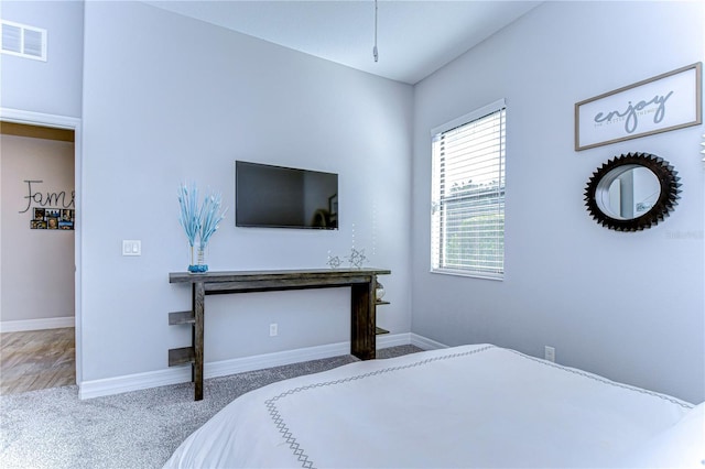 bedroom featuring carpet flooring