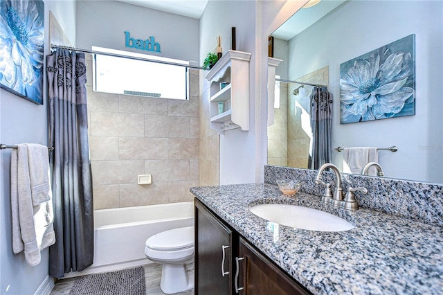 full bathroom featuring shower / tub combo with curtain, vanity, and toilet