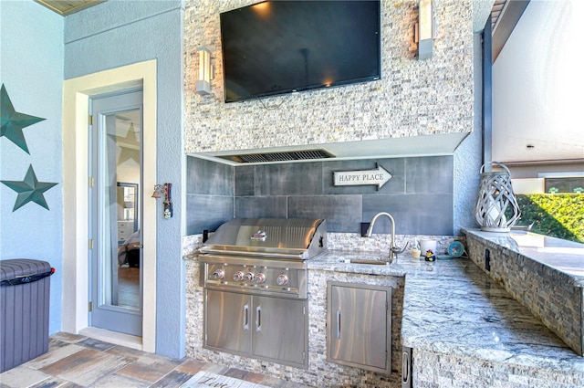 view of patio / terrace with sink, grilling area, and exterior kitchen