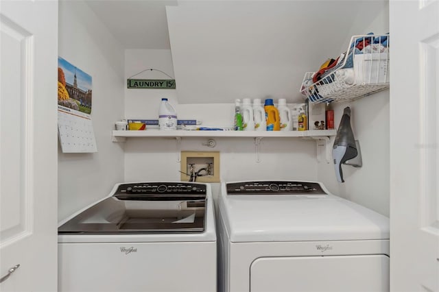 laundry room featuring washer and clothes dryer