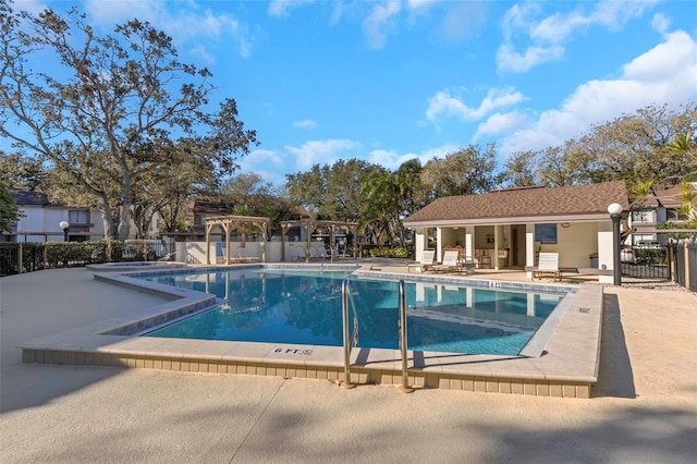 view of swimming pool with a patio area