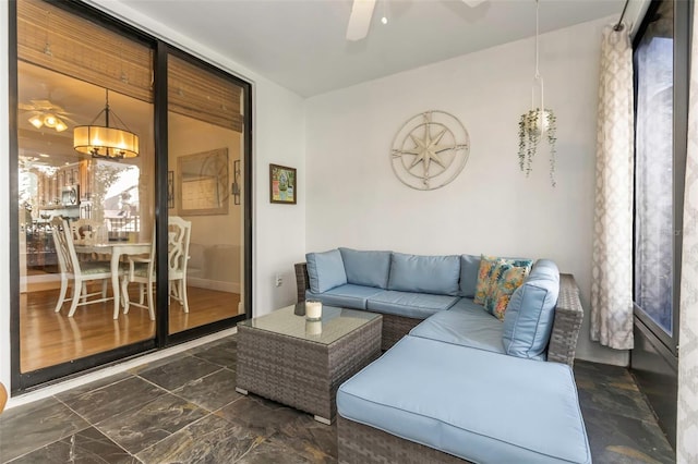 living room featuring ceiling fan