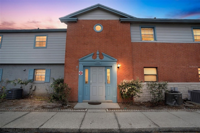 view of front property with central AC