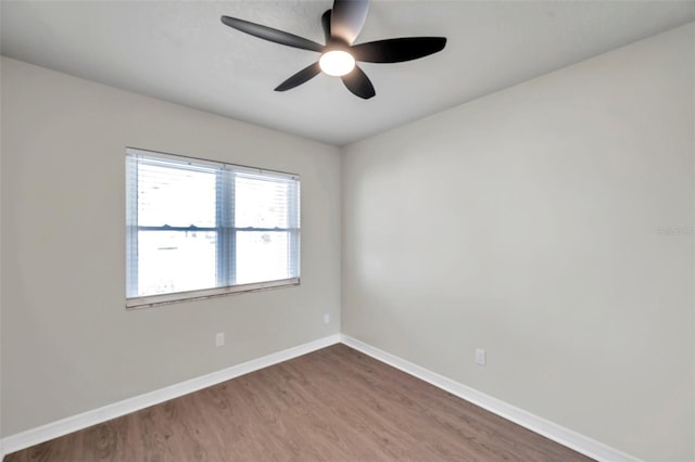 unfurnished room with wood-type flooring and ceiling fan