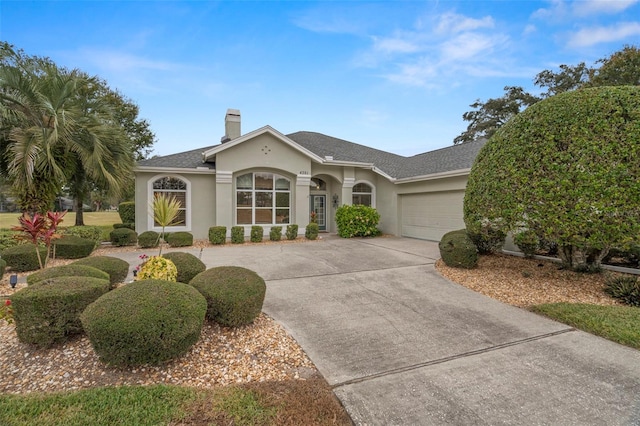 single story home with a garage