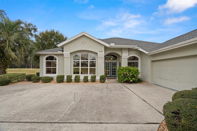 view of front of property featuring a garage