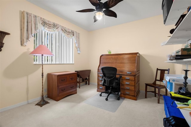 office space with light colored carpet and ceiling fan