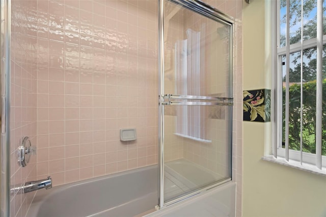 bathroom featuring enclosed tub / shower combo