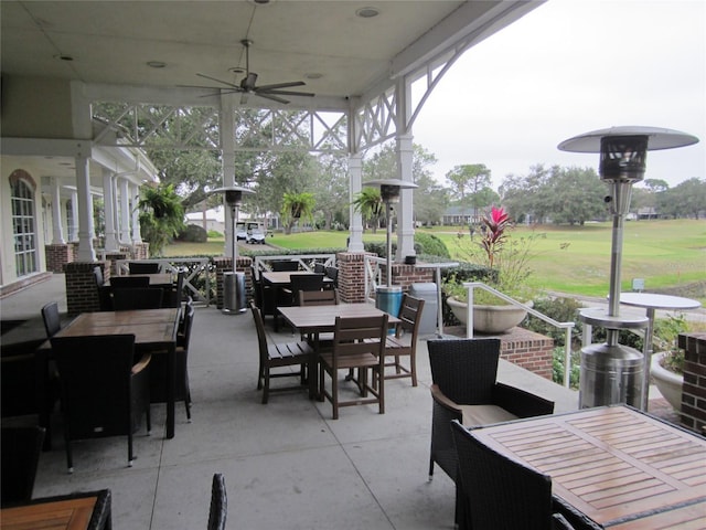 view of patio featuring ceiling fan