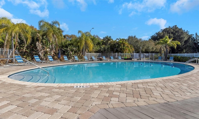 view of swimming pool featuring a patio