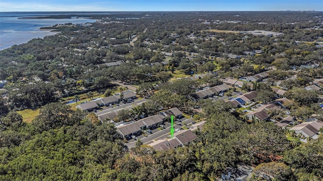 drone / aerial view featuring a residential view and a water view