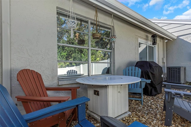 view of patio with central AC and grilling area