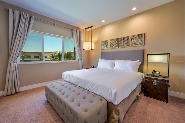 bedroom with light carpet