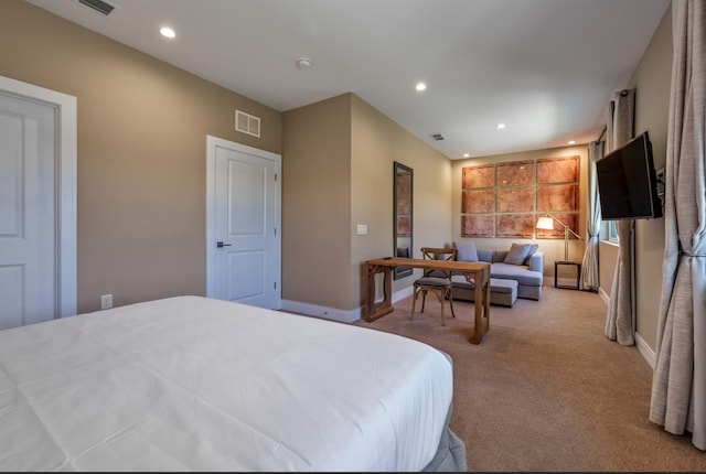 bedroom with light colored carpet