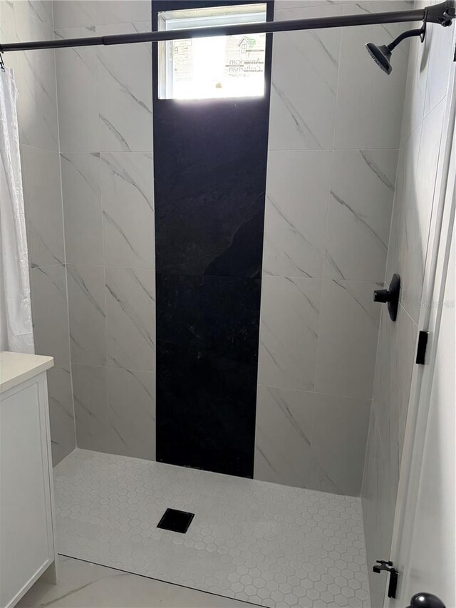 bathroom featuring a stall shower