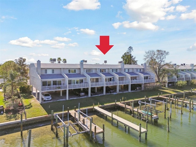 dock area with a water view