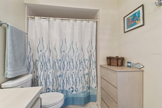 full bathroom with vanity, toilet, and shower / tub combo with curtain