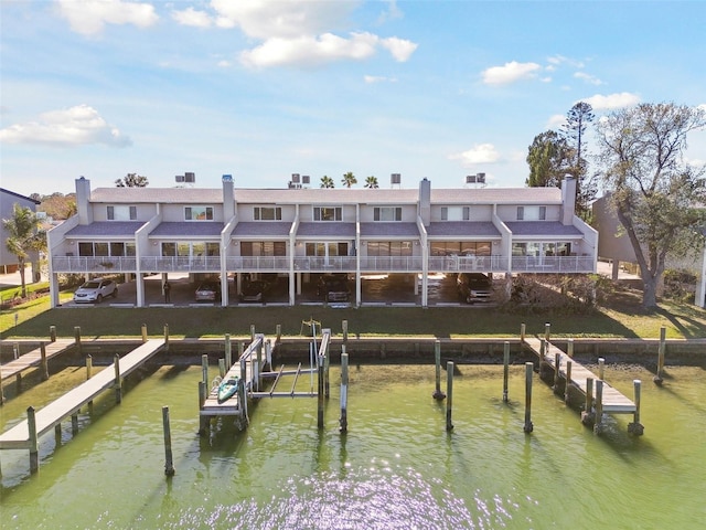 dock area with a water view