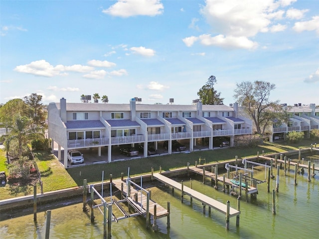 dock area with a water view