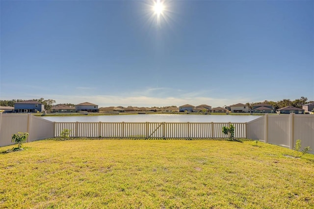 view of yard with a water view