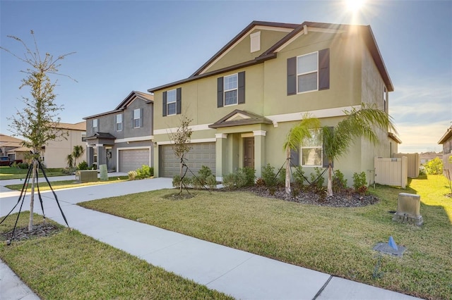 view of front facade featuring a front yard and a garage