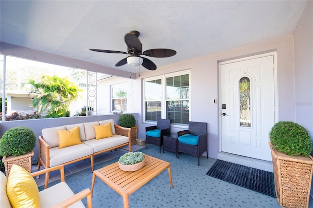 sunroom / solarium with ceiling fan