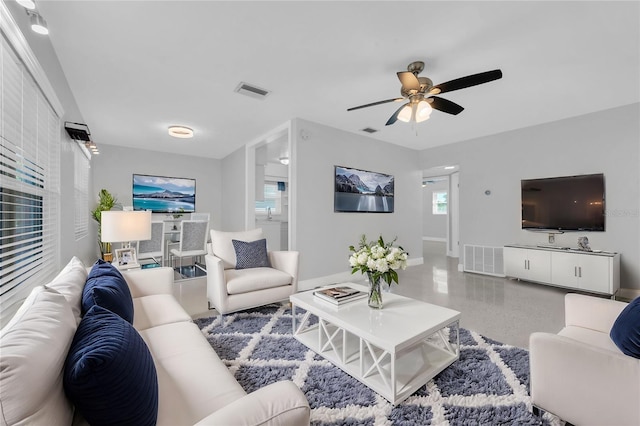 living room featuring ceiling fan