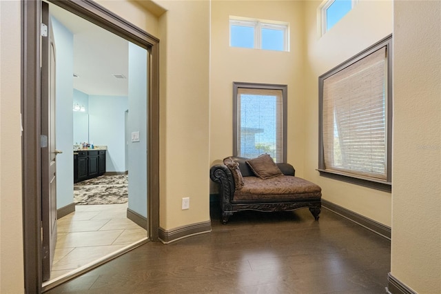 sitting room with light wood-type flooring