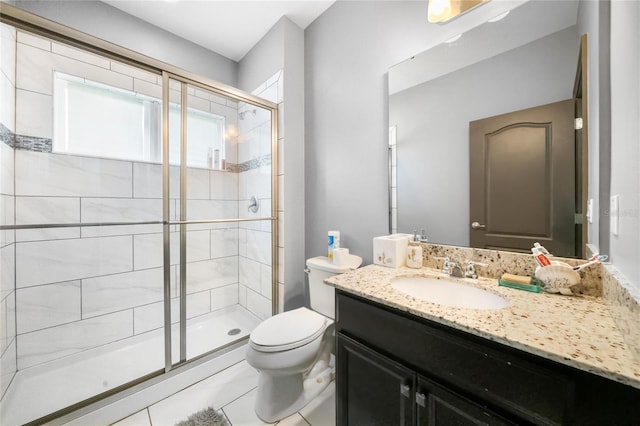 bathroom featuring vanity, an enclosed shower, tile patterned floors, and toilet