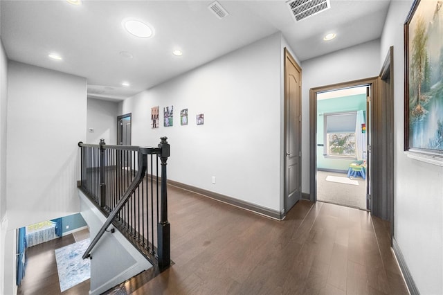 hallway featuring dark hardwood / wood-style floors