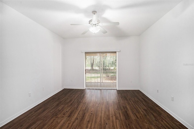 unfurnished room featuring dark hardwood / wood-style floors and ceiling fan