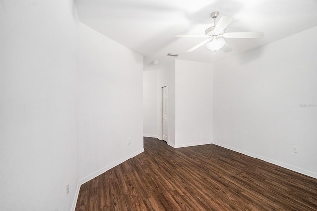 unfurnished room featuring dark hardwood / wood-style flooring and ceiling fan