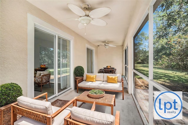 sunroom / solarium with ceiling fan